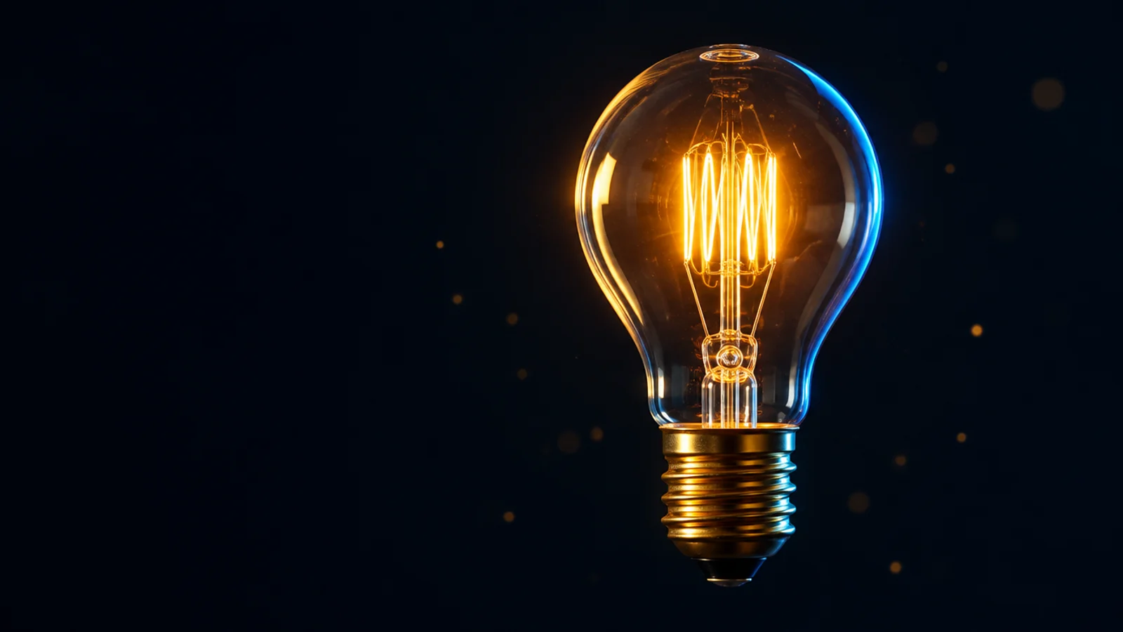 A clear incandescent lightbulb with its filament glowing, the idea a patent protects